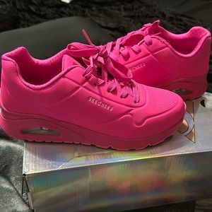 Like new bright pink shoes. Size 5.5 in little girls